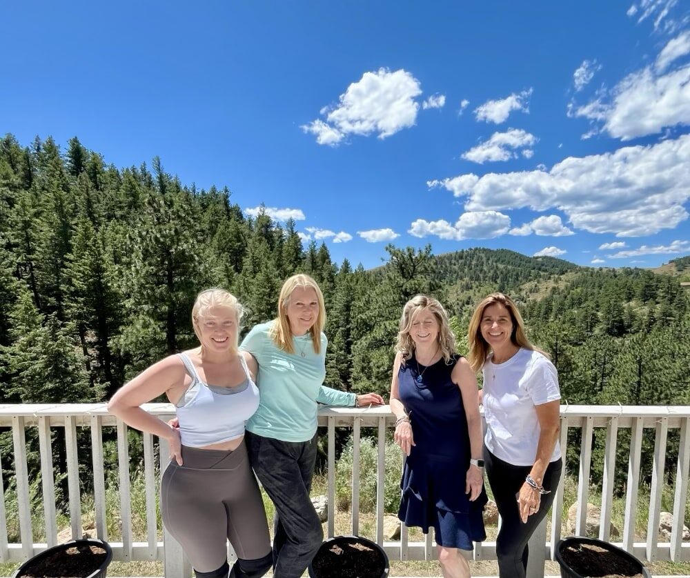 Authors on the deck of the Golden, Colorado retreat center